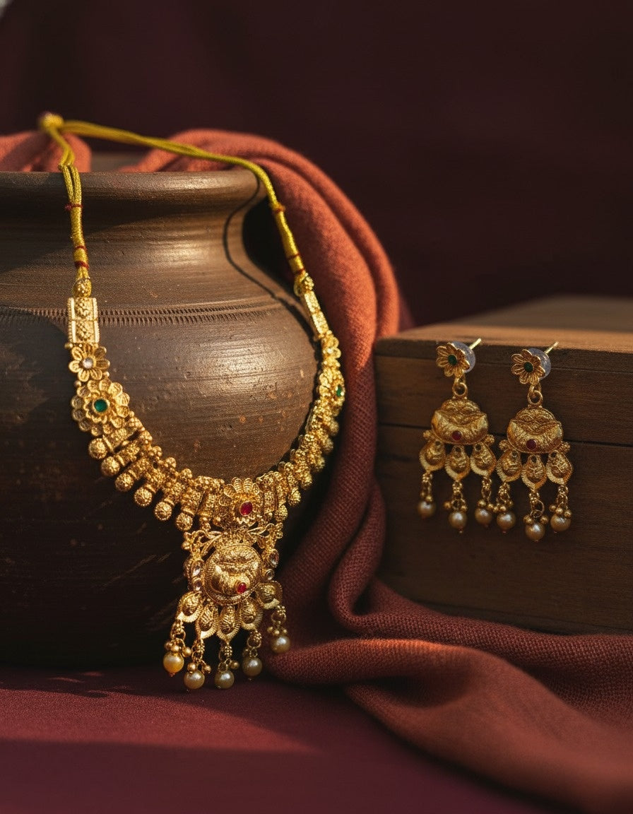Sondarya Regal Antique Gold-Toned Temple Jewelry Set With Earrings